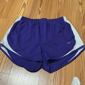 purple and white nike shorts